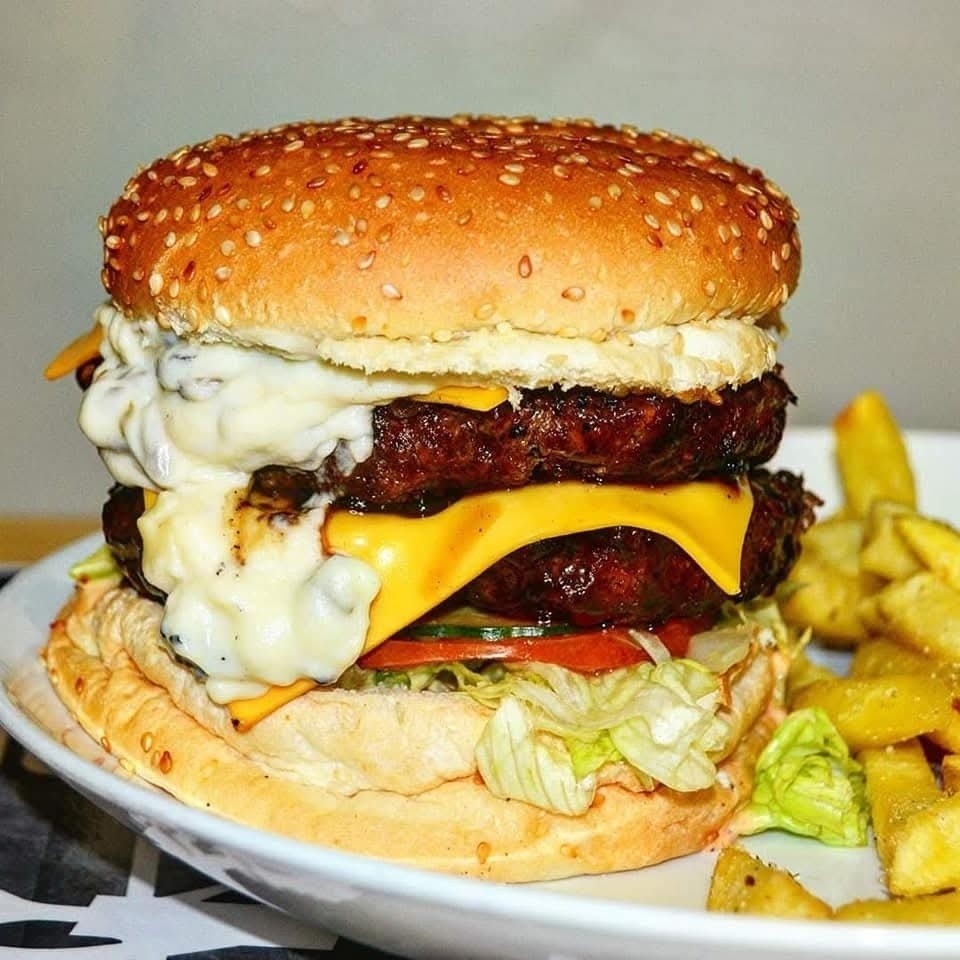 Flame-grilled burger and fries